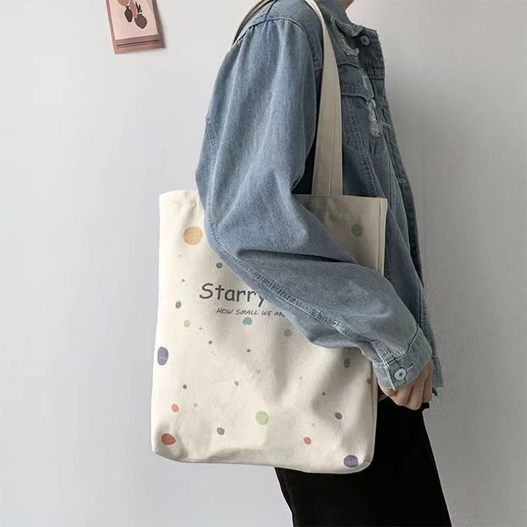 Borsa tote in tela di cotone 100%.